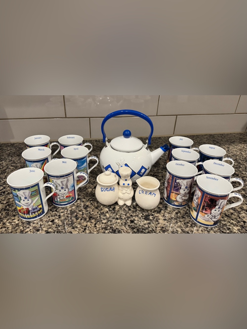 Vintage 1999 Pillsbury Doughboy Enamel Teapot, ‘01 Ceramic(12)Mugs, Cream&Sugar